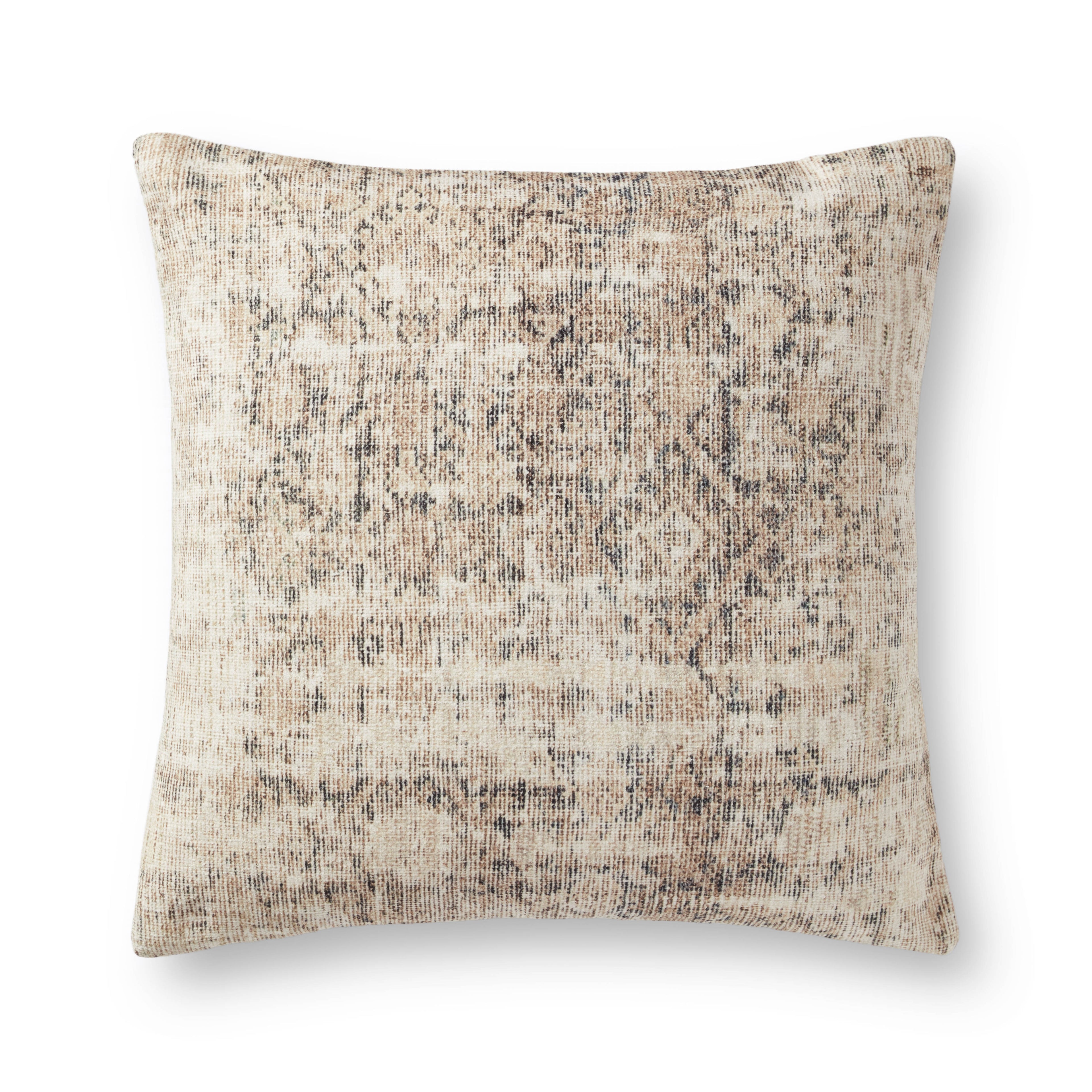 Textured pillow with a neutral color palette on a white background