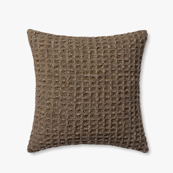 Brown textured pillow on a white background