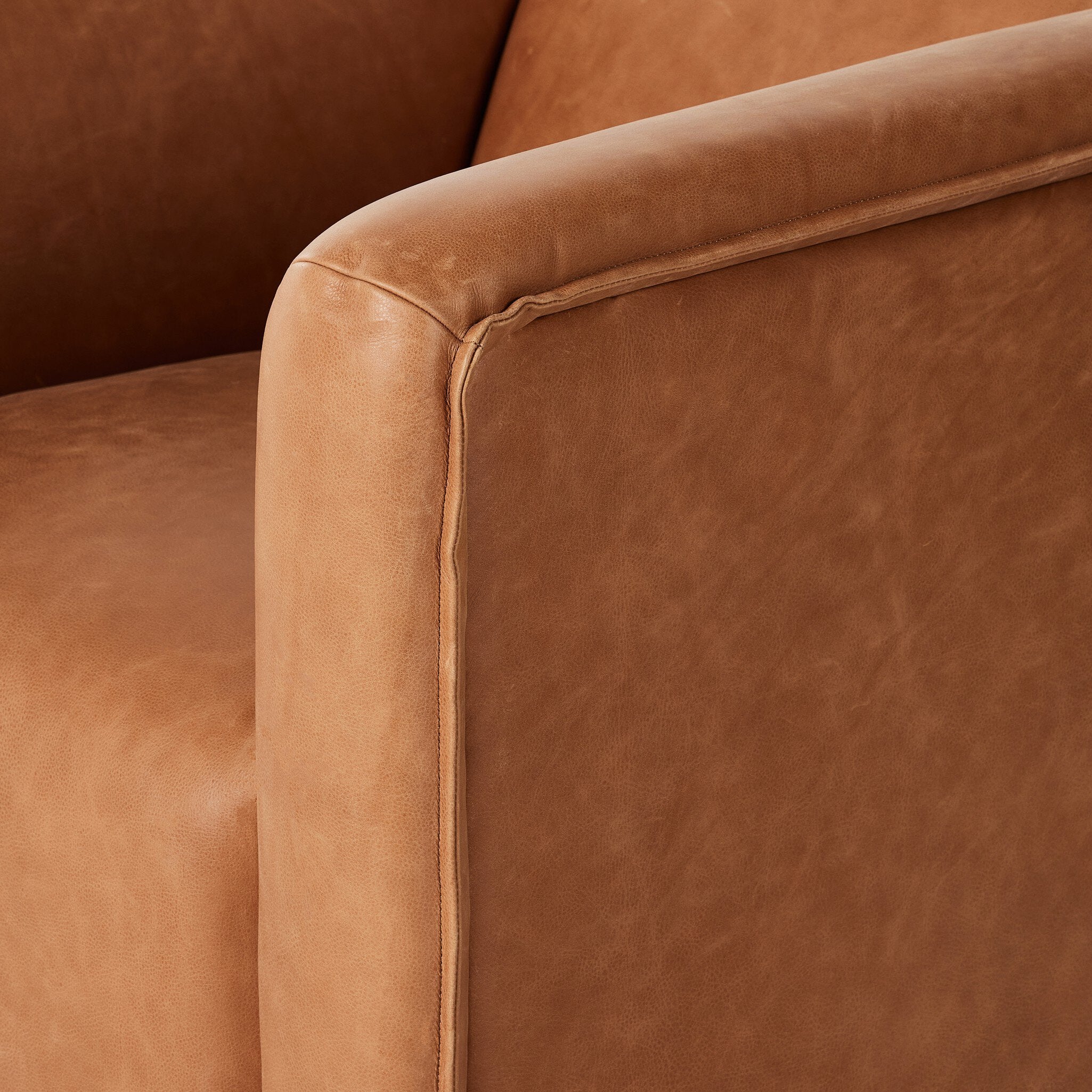 Wellborn Swivel Chair - Palermo Cognac