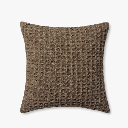 Brown textured pillow on a white background